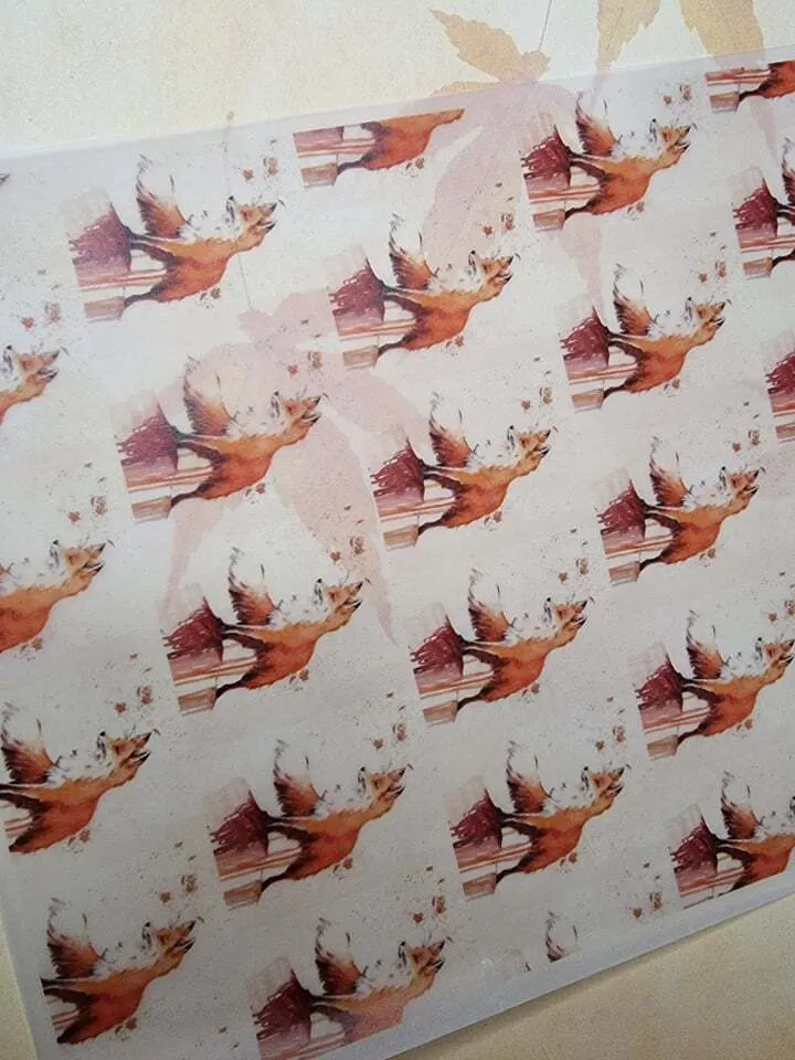 Sheet of autumn vellum paper printed with foxes and falling leaves